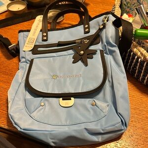 Sherpani cross body: brand new in sky blue 
Model is Trevia